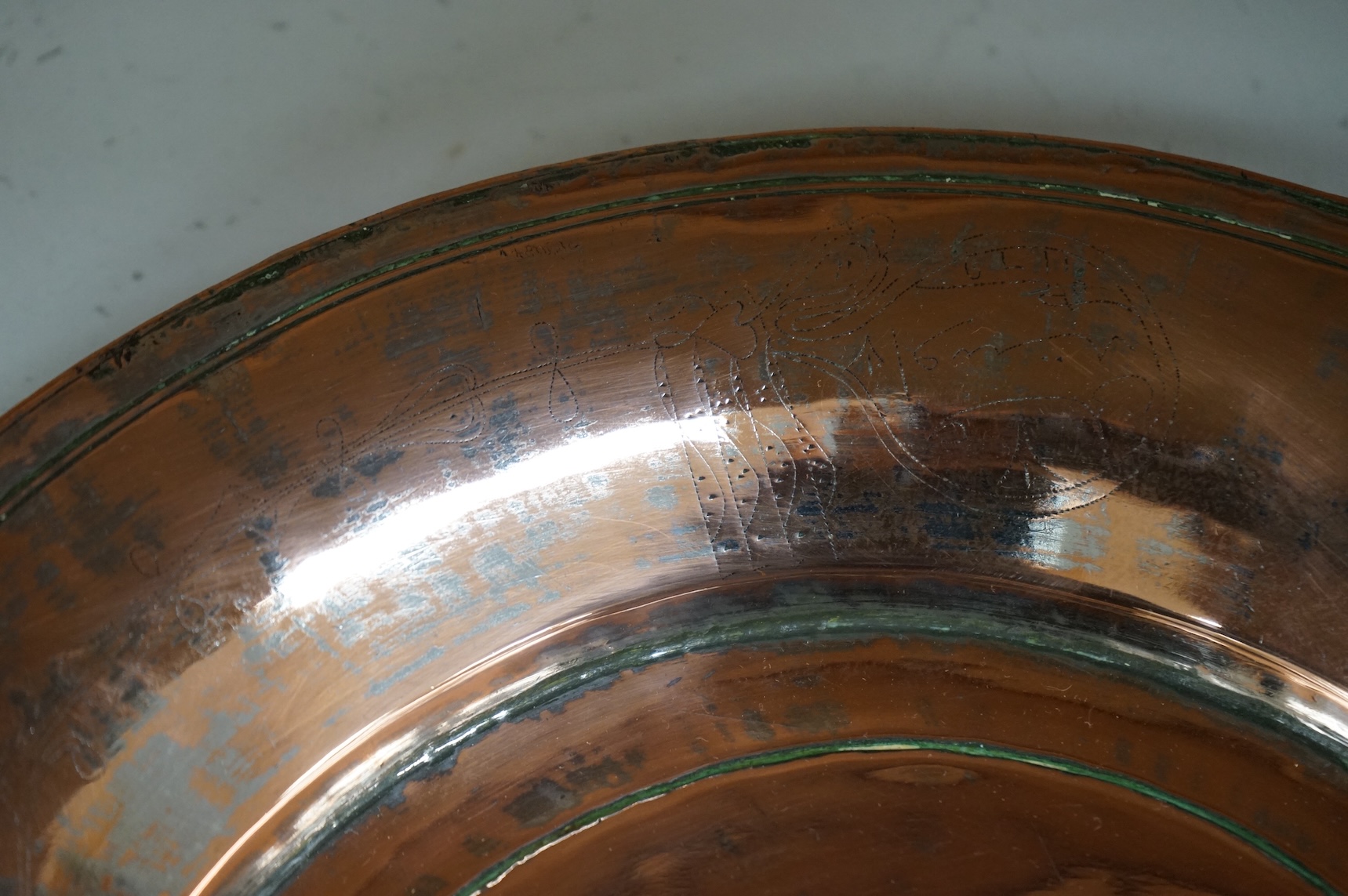 An 18th century Persian tinned copper dish, 34cm diameter.